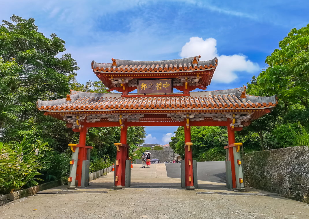 Red Shureimon Gate in Shuri castle in Okinawa, Japan with blue sky