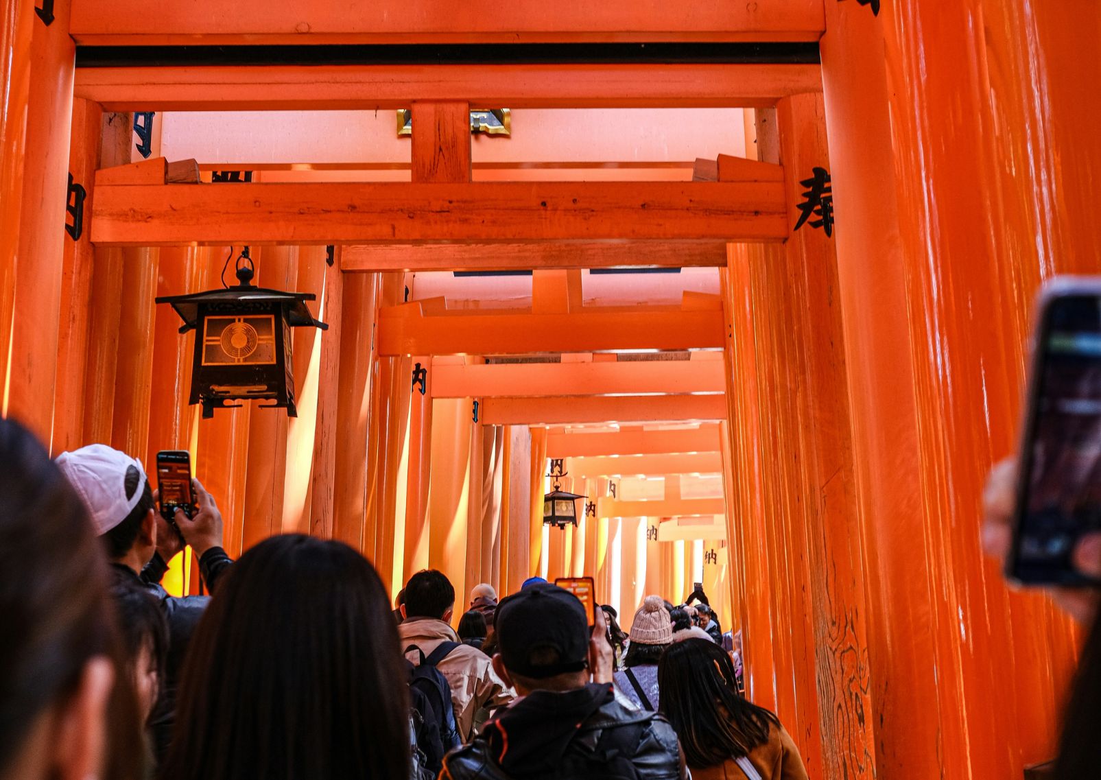 Crowded Fushimi Inari shrine in Kyoto, Japan