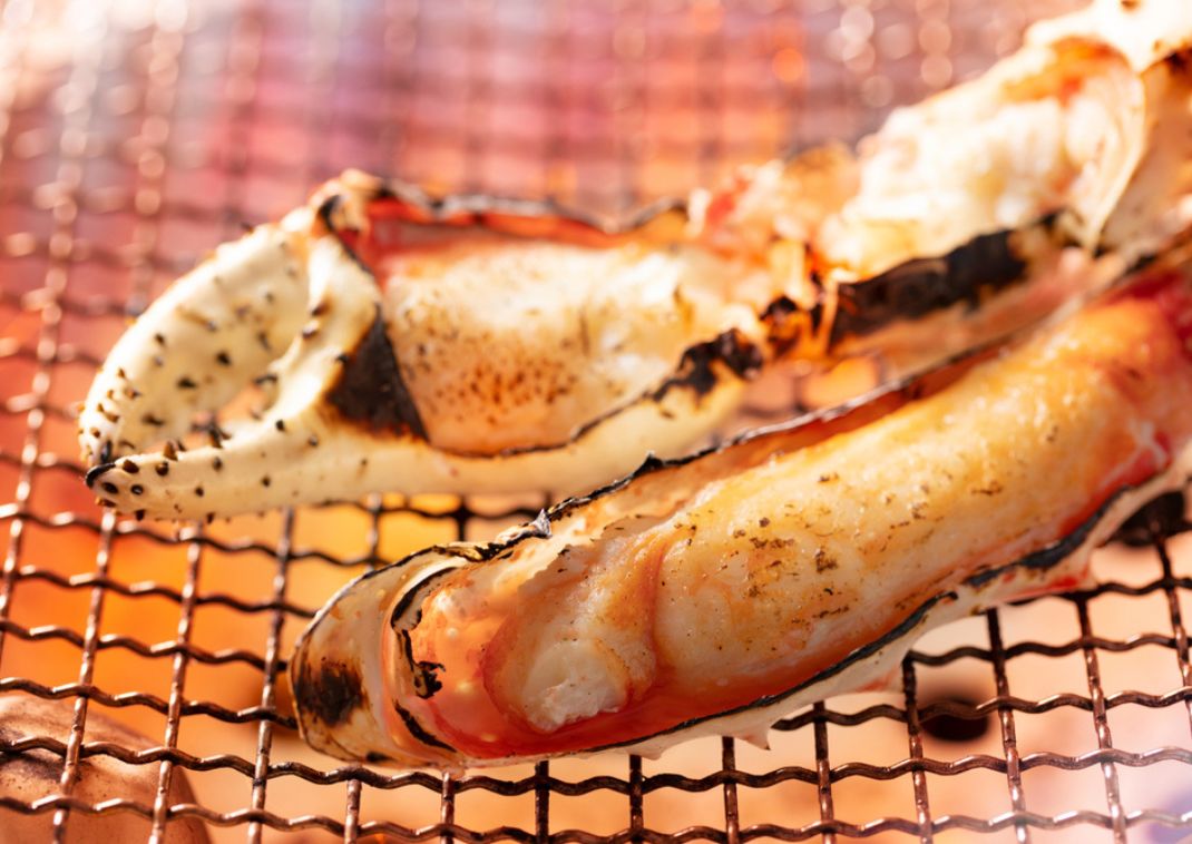 Red King Crab claws on a grill