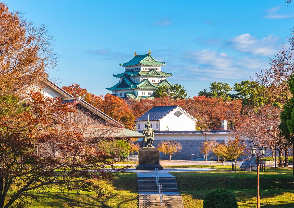 Nagoya Castle with statue in autumn