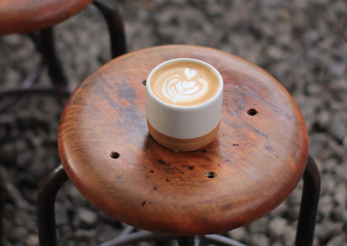 Minimalist coffee on vintage furniture
