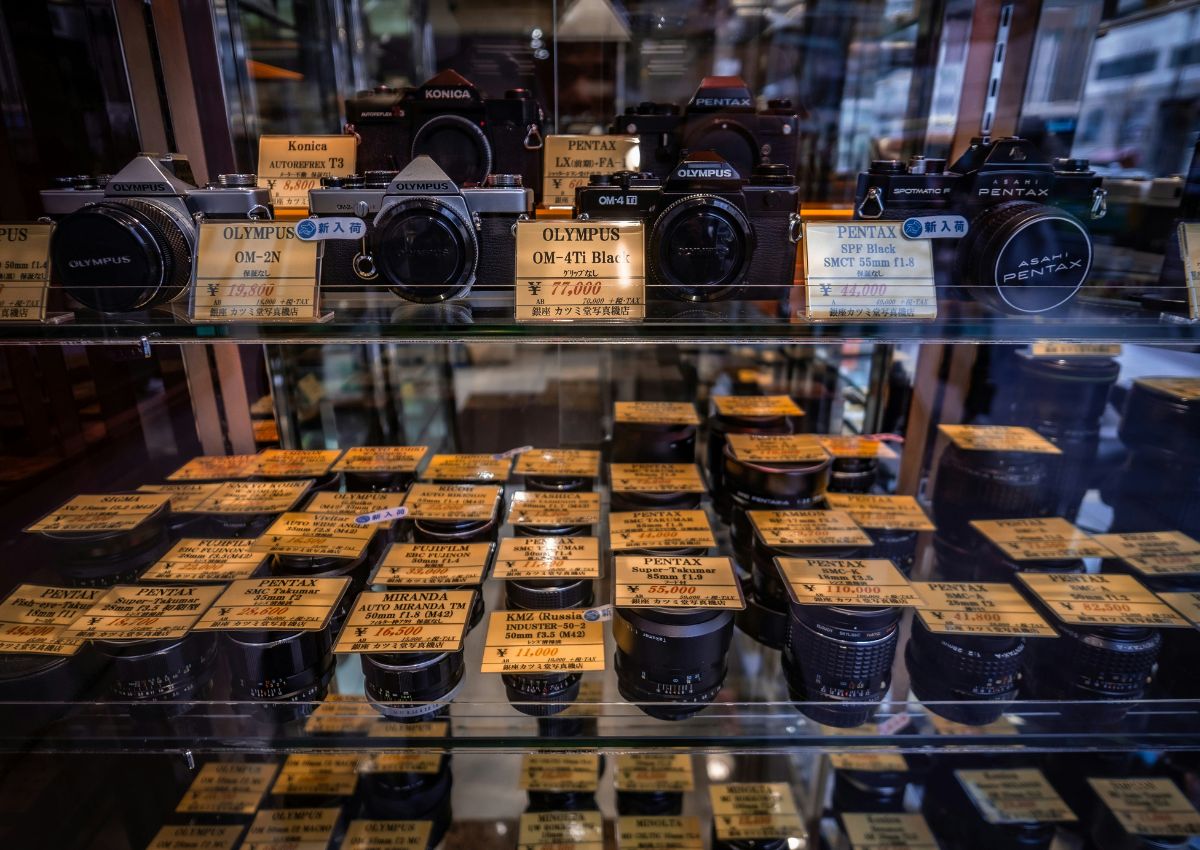 Vintage cameras displayed in store window