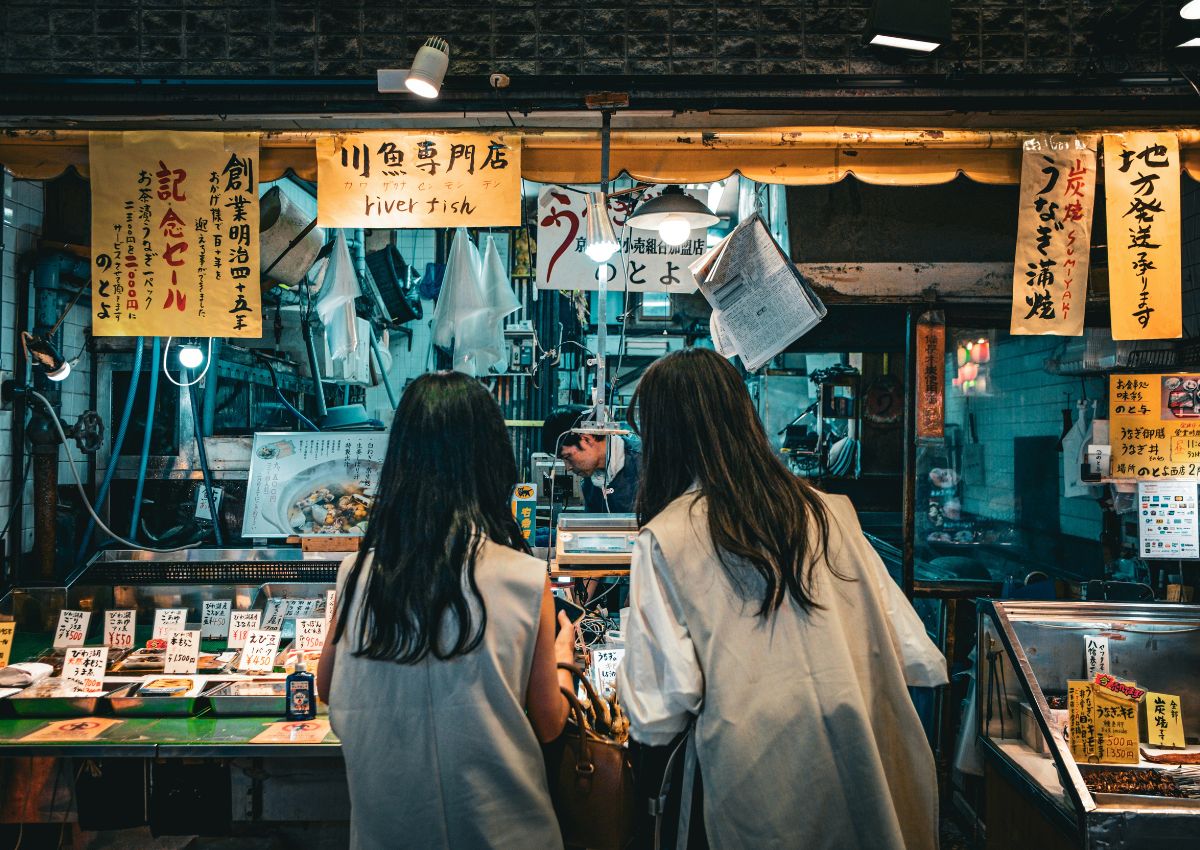 Tourists in Nishiki Market, Kyoto, Japan