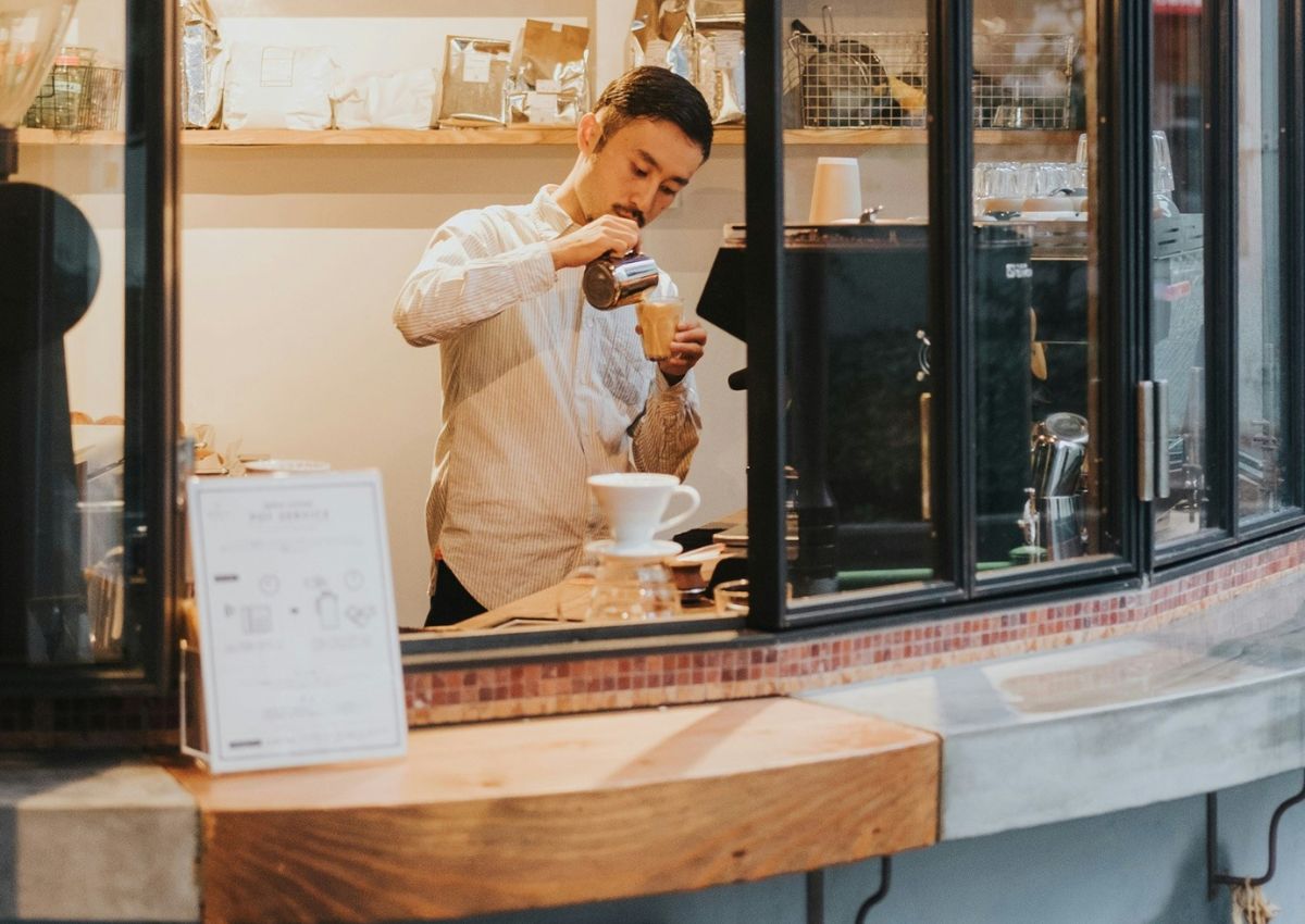 Barista pouring cafe in Tokyo, Japan