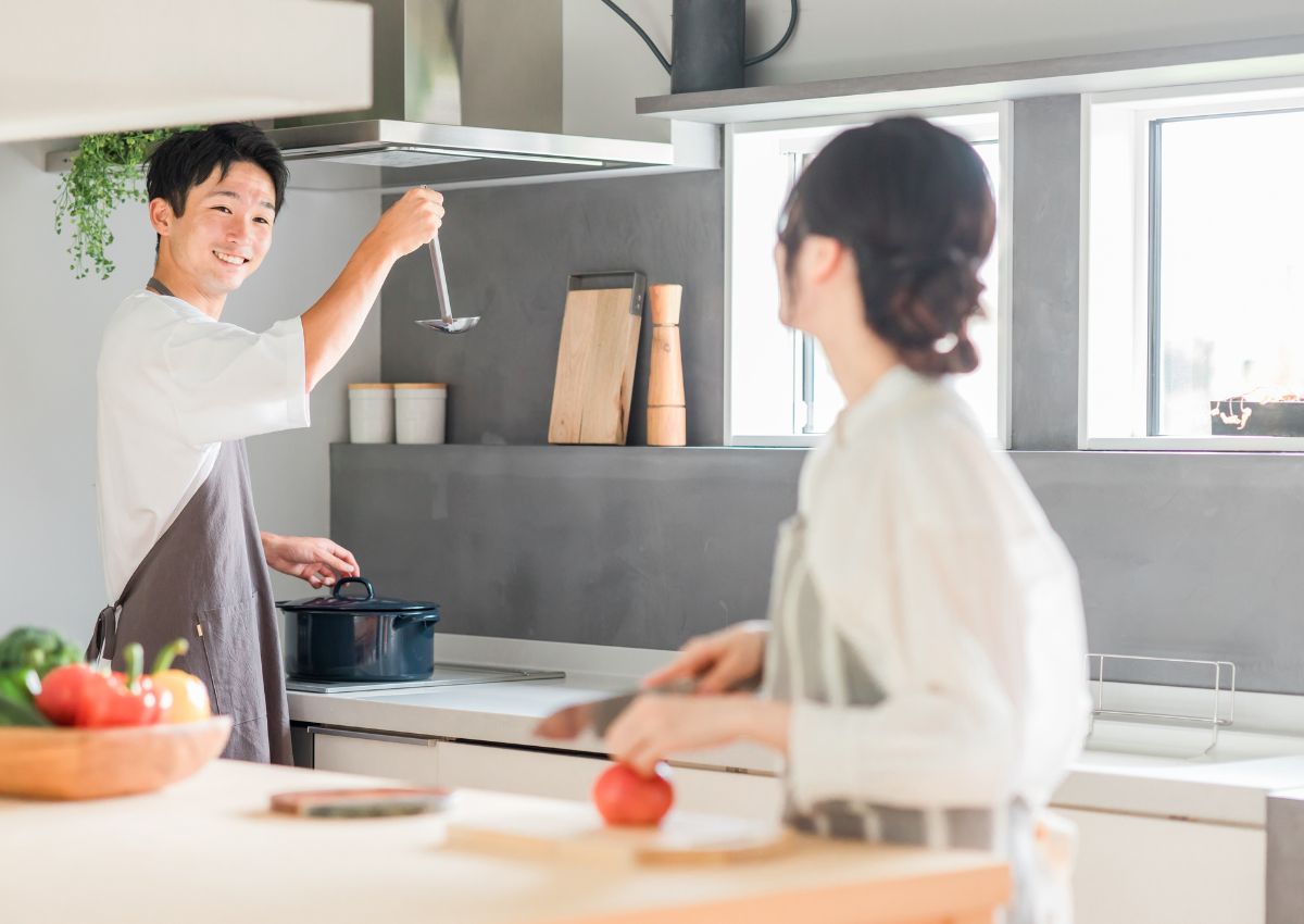 Japanese couple cooking curry at home