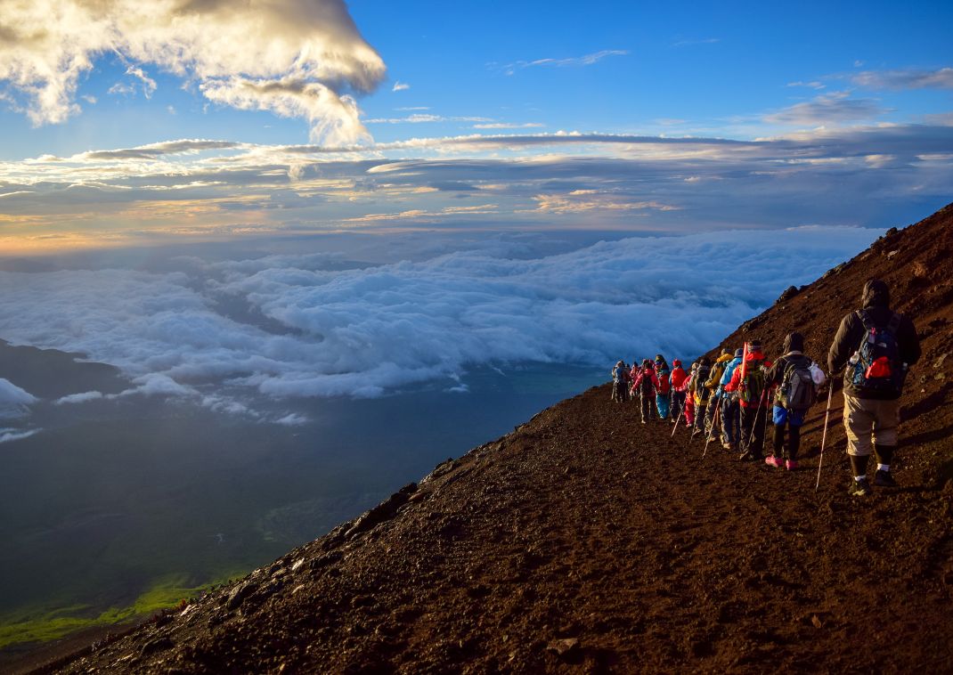 Tourists climbing Mt Fuji, Japan