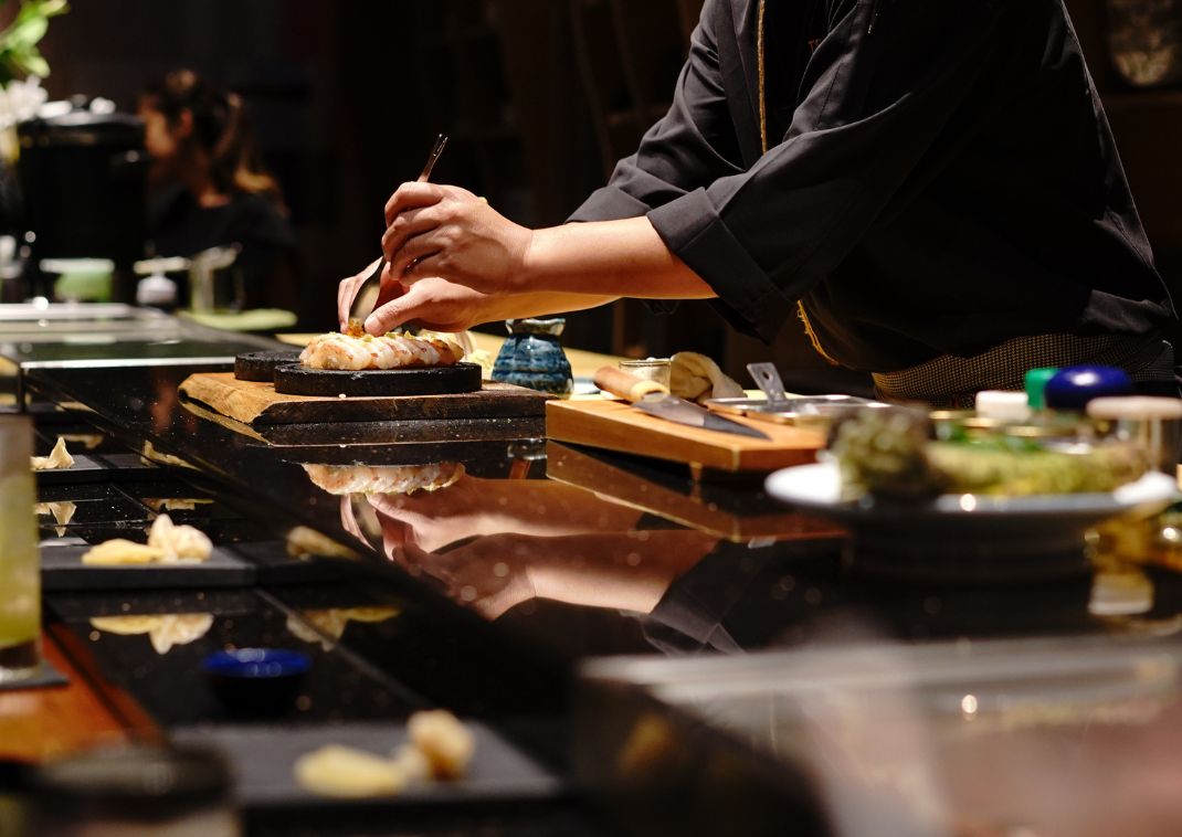 Sushi being prepared by a Japanese sushi chef
