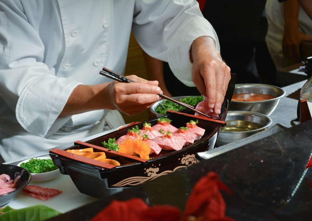 Sushi being served by a traditonal Japanese chef