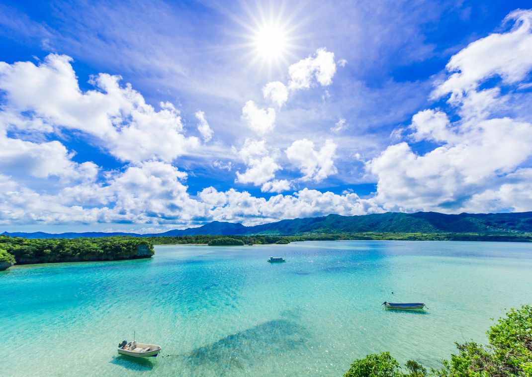 Kabira Bay, Okinawa in summer, aerial view of beautiful landscape, tourism boats