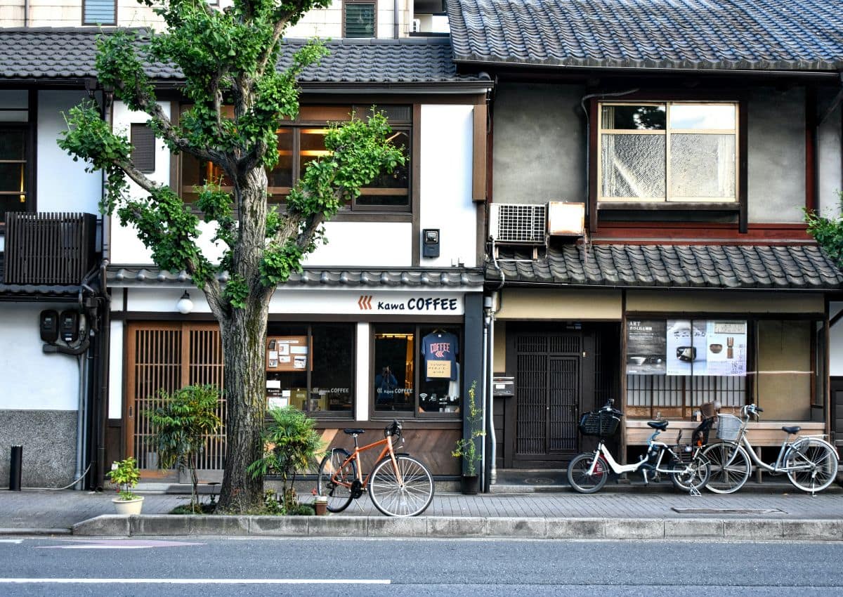 Bicycle parked outside of kissaten coffee shop, Tokyo