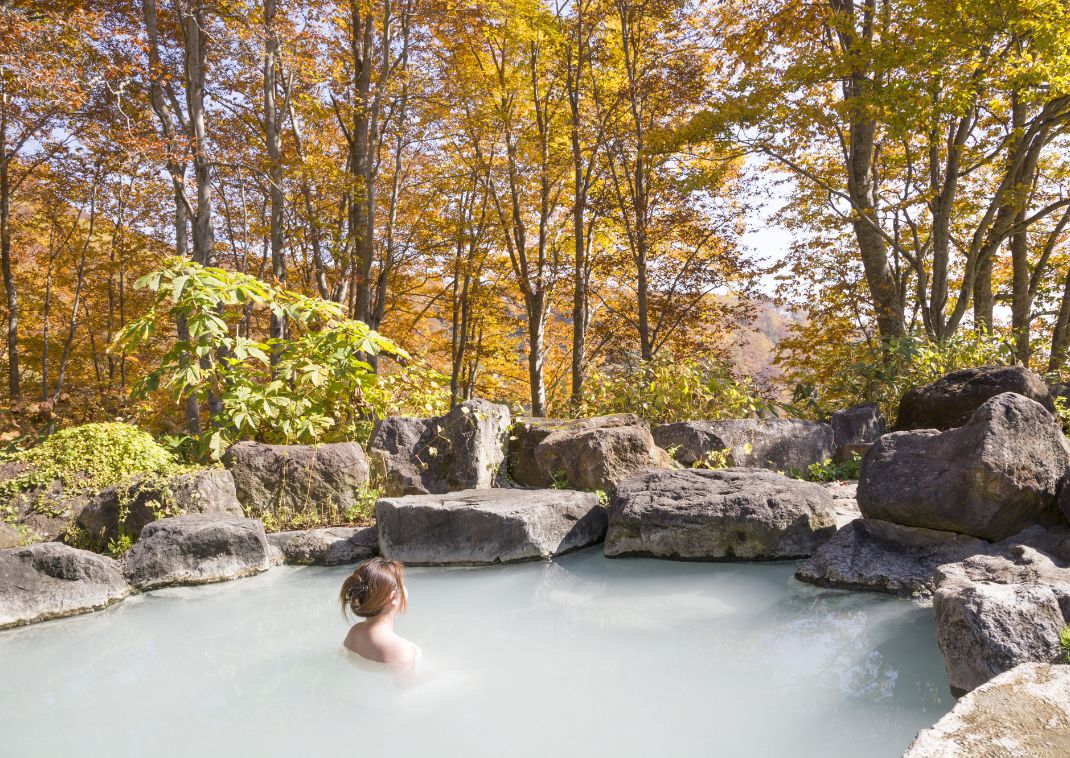 Outdoor onsen bath in Japan in autumn