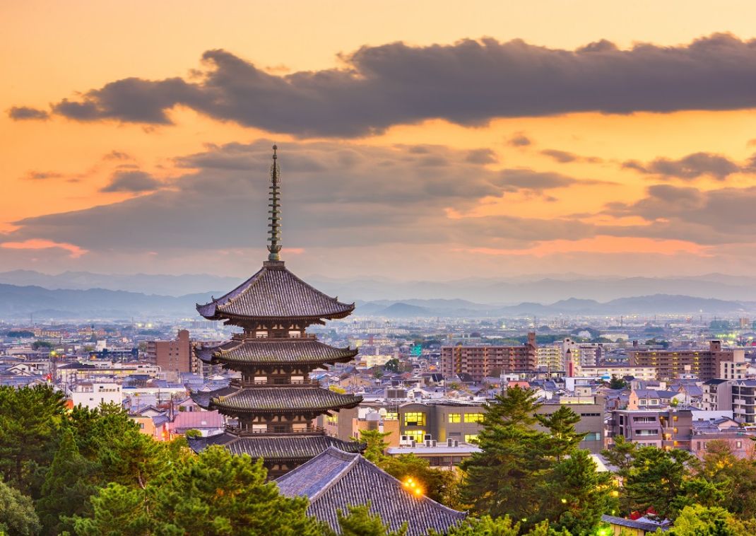 Nara, Japanese pagoda and cityscape at dusk