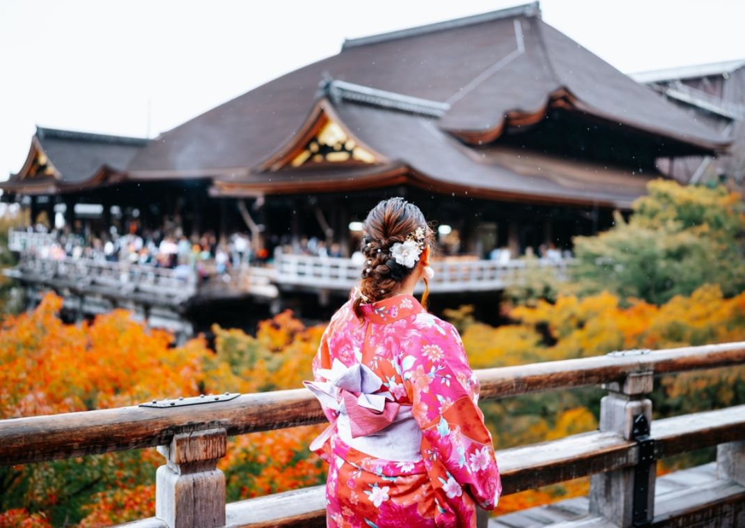 Woman wearing kimono at Kiyomizu Temple in autumn season, Kyoto, Japan