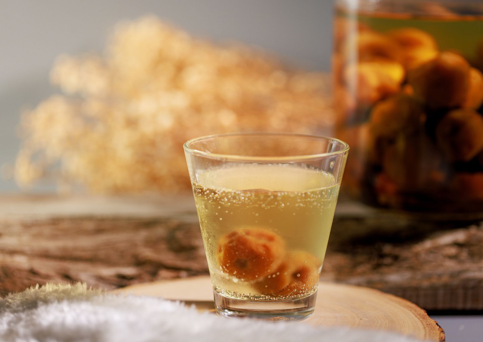 Fresh sweet plum wine umeshu, Japanese drink