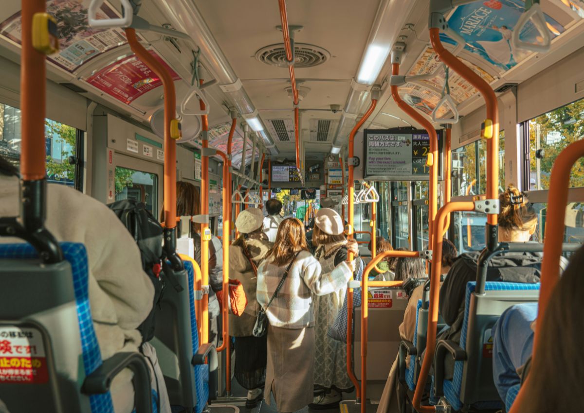 Locals taking a public bus in Kyoto, Japan