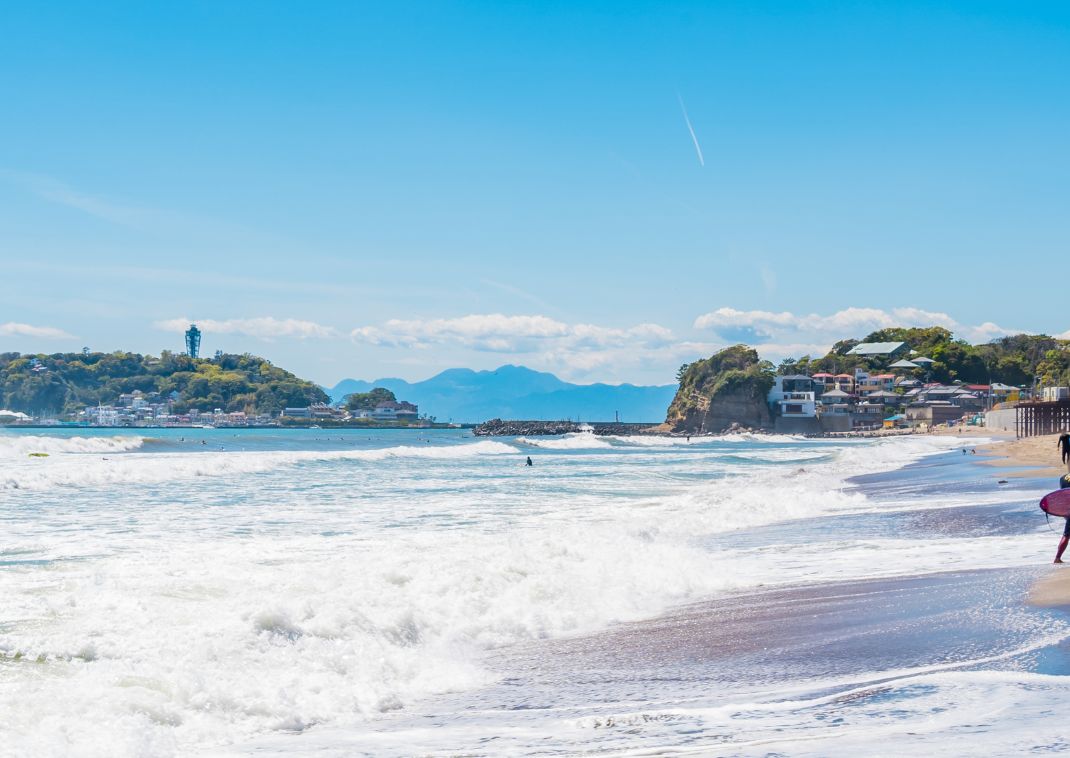 Surfing in Enoshima beach, Kanagawa, Japan.