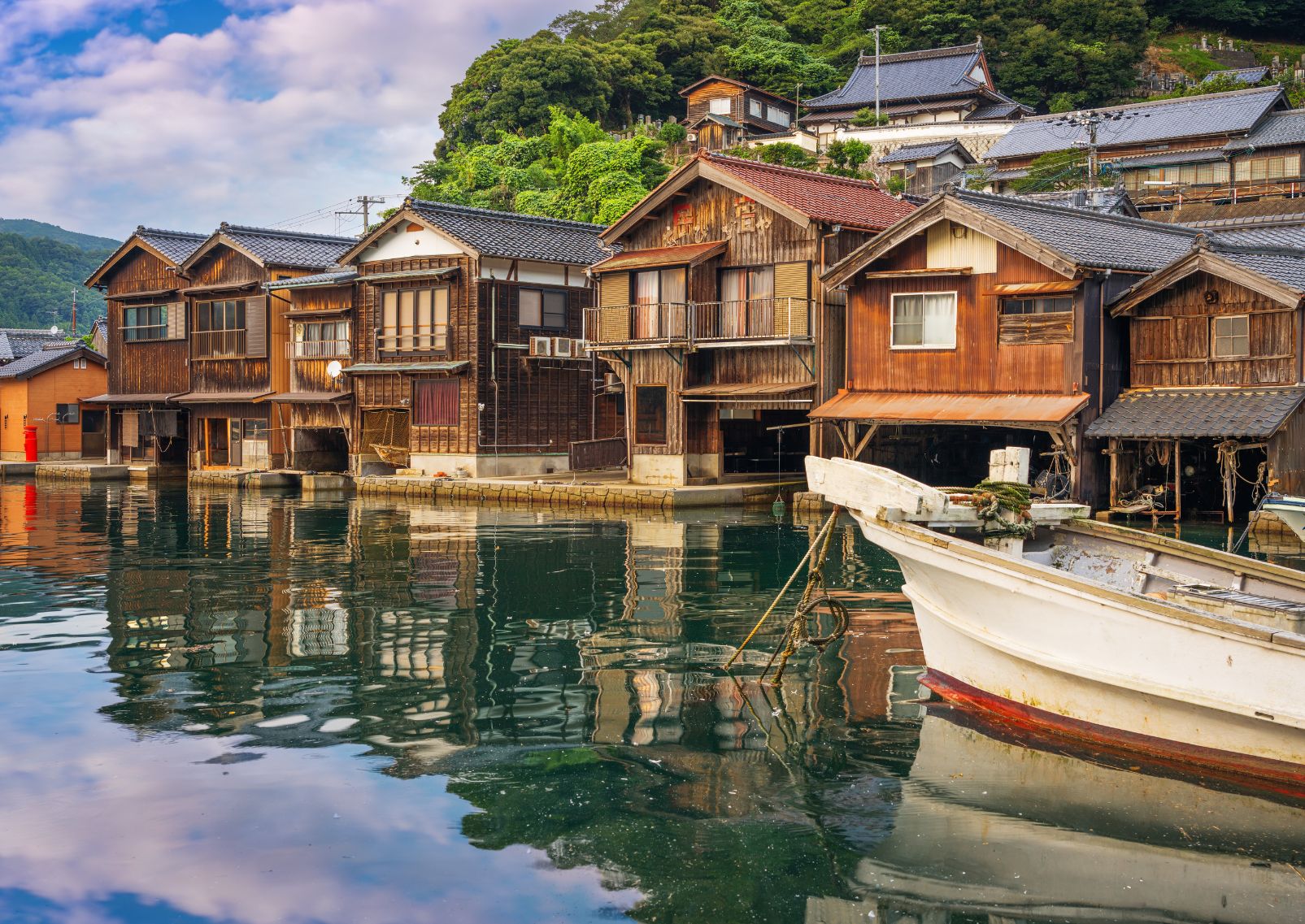 Traditional Japanese wooden boat houses on the water in Ine, Kyoto prefecture