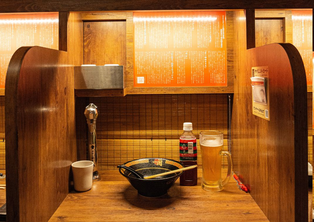 Single booth at ramen shop, Japan