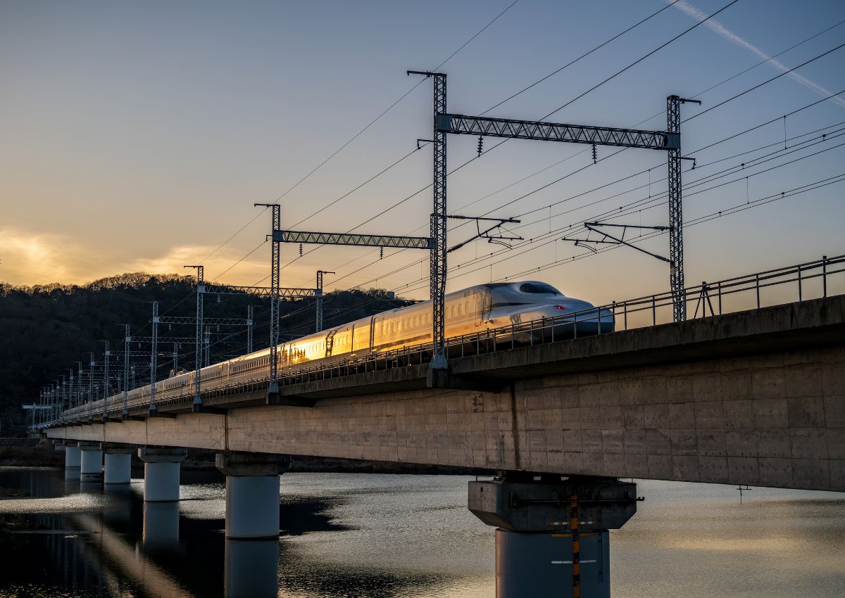 Shinkansen bullet train moving through Okayama, Japan