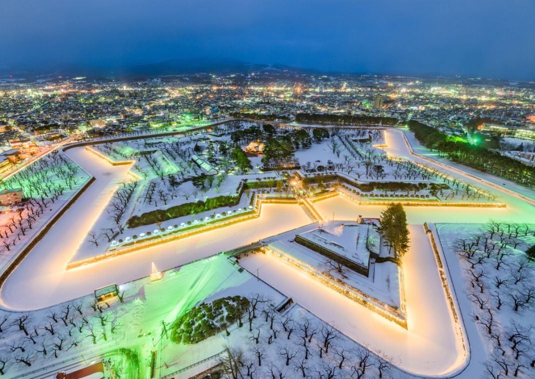  Illuminated star-shaped Goryokaku Park in Hakodate covered in snow