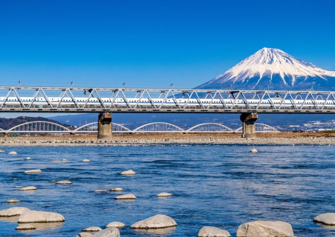 train passing mount fuji fujikawa bridge