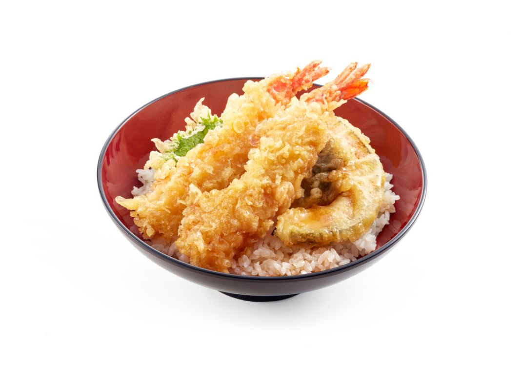 Tasty shrimp and kabocha tempura on a bowl of rice