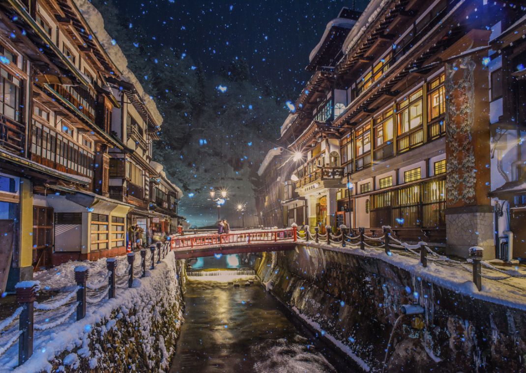 Night view of falling snow in Ginzan Onsen