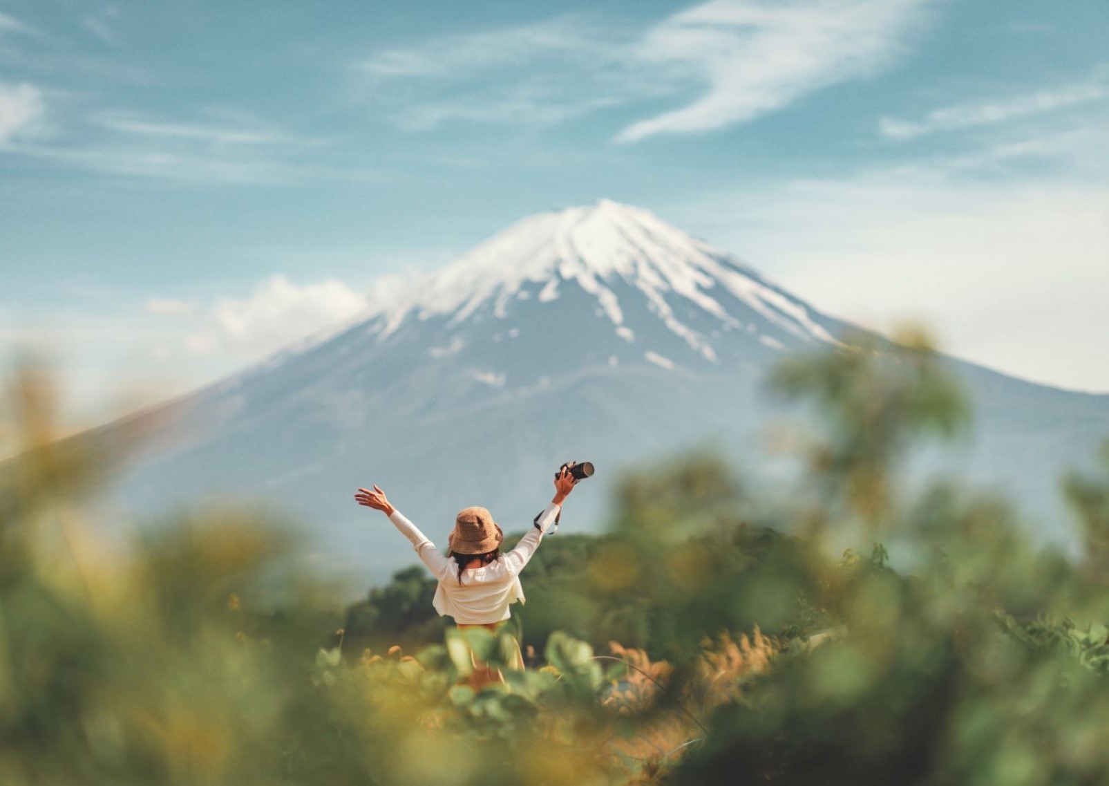 Happy woman in summer at Mount Fuji, Japan