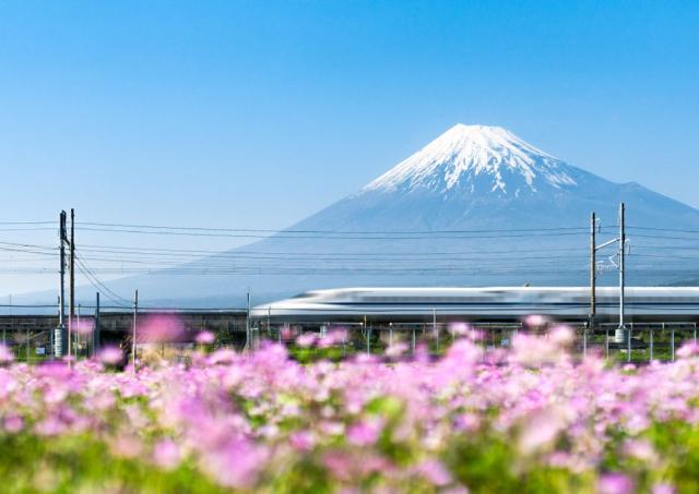 high speed train passing by mount