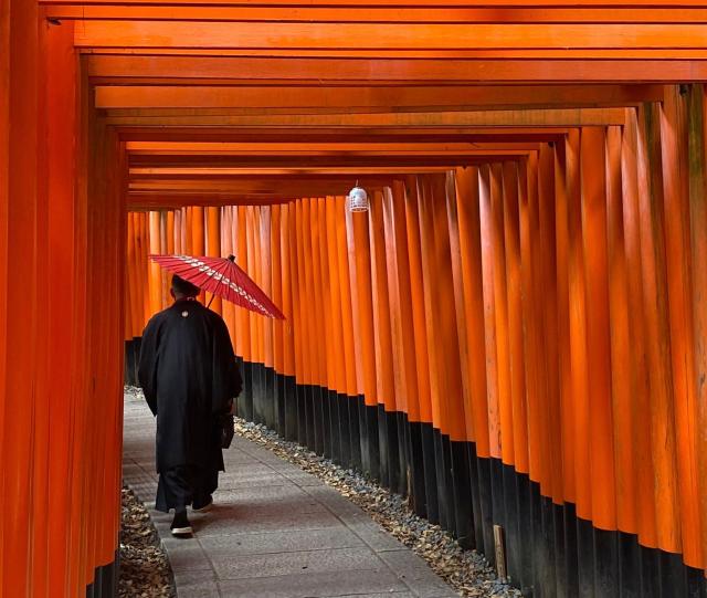 Surrounded by a sea of sake barrels at the Meiji Shrine in Tokyo