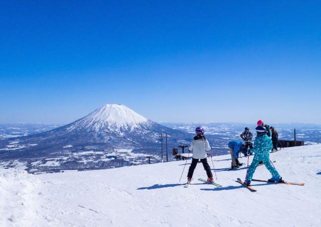 Skiers on the slopes of Niseko, Japan