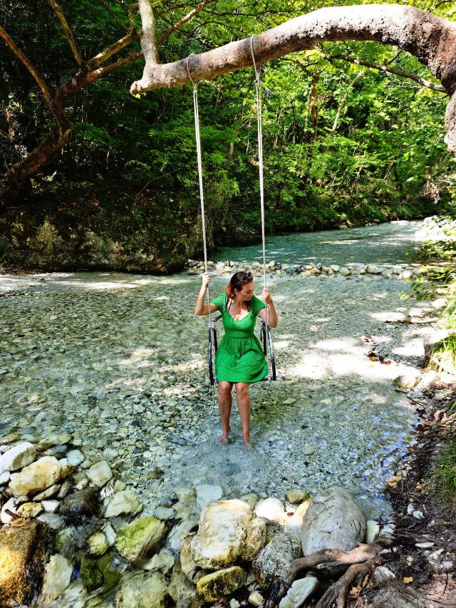 Swinging above the water in Edessa National Park, Greece