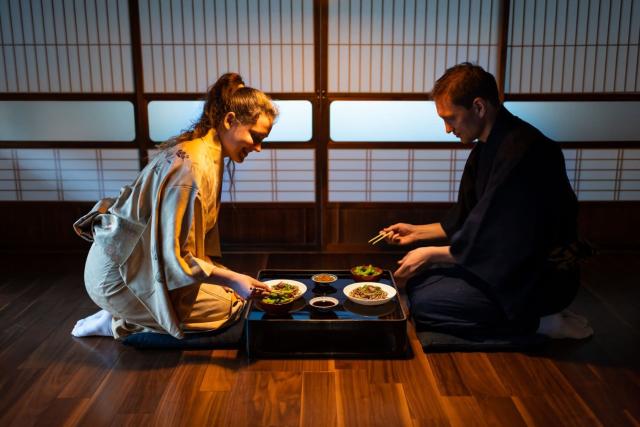 Having a traditional meal at a ryokan