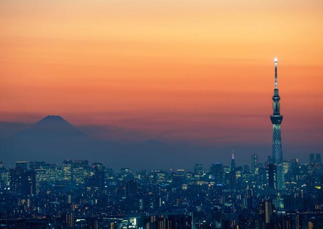 Tokyo Skytree against city and Mt Fuji as dusk