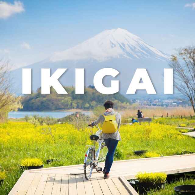 Women with bicycle and Mount Fuji at the background 