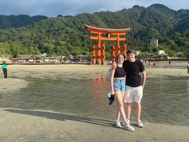The children by the torii gate of the Itsukushima Shrine on Miyajima