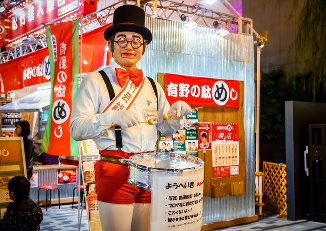 Entertainer performing on Dotonbori Street, Osaka