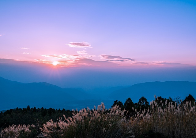 Sunset over Mount Aso’s outer crater rim