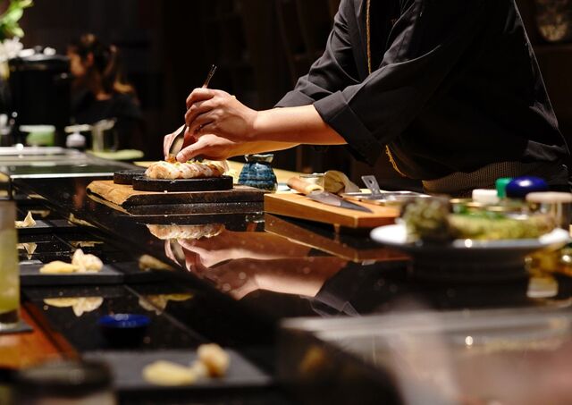 Chef preparing omakase sushi