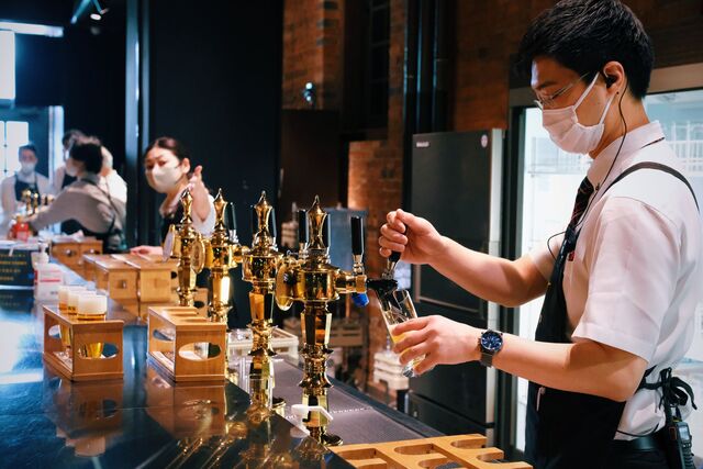 Bartenders at the Sapporo Beer Museum 
