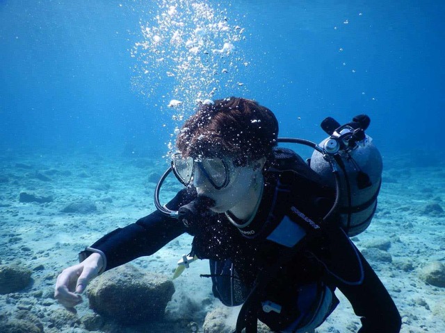 Scuba diving off the coast of Shikinejima
