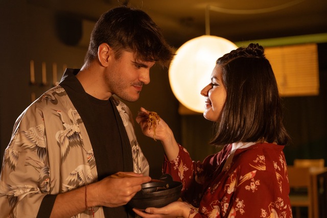 Couple sharing Japanese food 