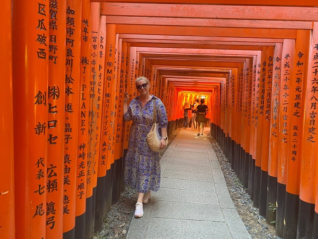 Under the torii gates of Fushimi Inari Shrine, Kyoto