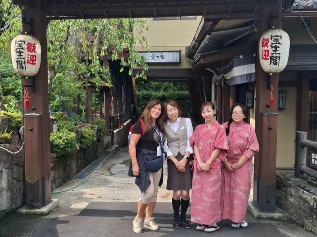 With ladies wearing yukata