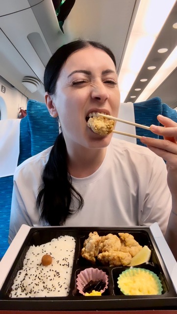 Eating a bento box on a Shinkansen