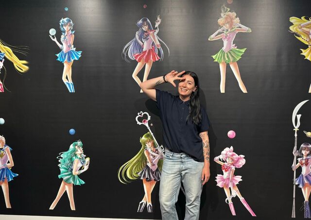 With a Sailor Moon backdrop in Japan