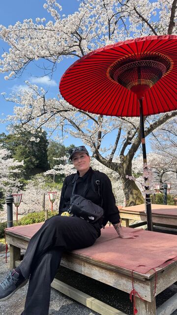With cherry blossoms in Japan