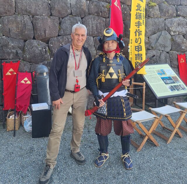 With a Japanese man dressed as a samurai 