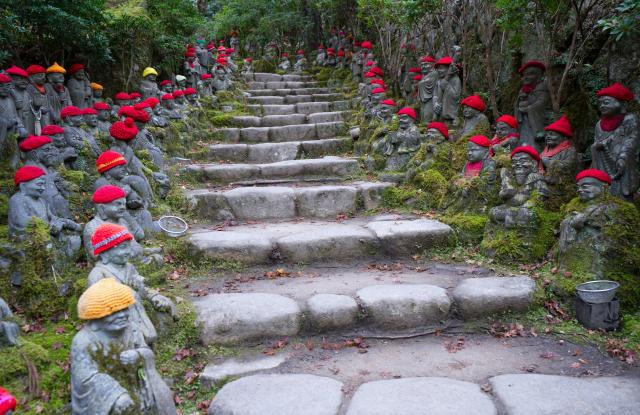 Stairs in a garden with many Buddha statues Located next to Daishoin Temple