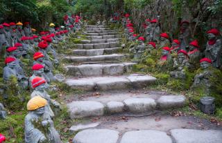 Stairs in a garden with many Buddha statues Located next to Daishoin Temple